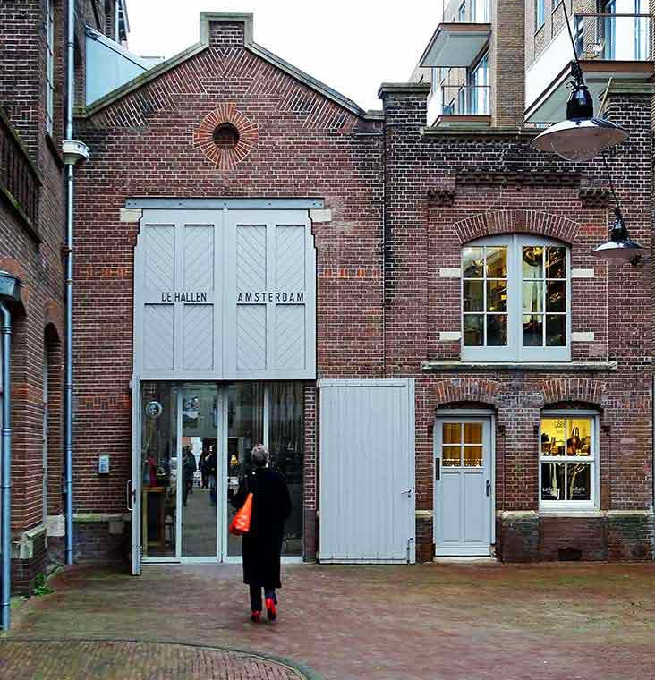 Cultural centre, Amsterdam - De Hallen repurposes industrial heritage into a mixed-use cultural space, combining food, design and public life.
