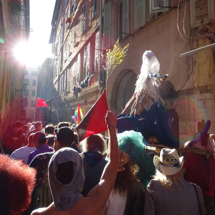 Public celebration, Nice - May Day festivities spill into the streets, a historic ritual preserved by city dwellers.