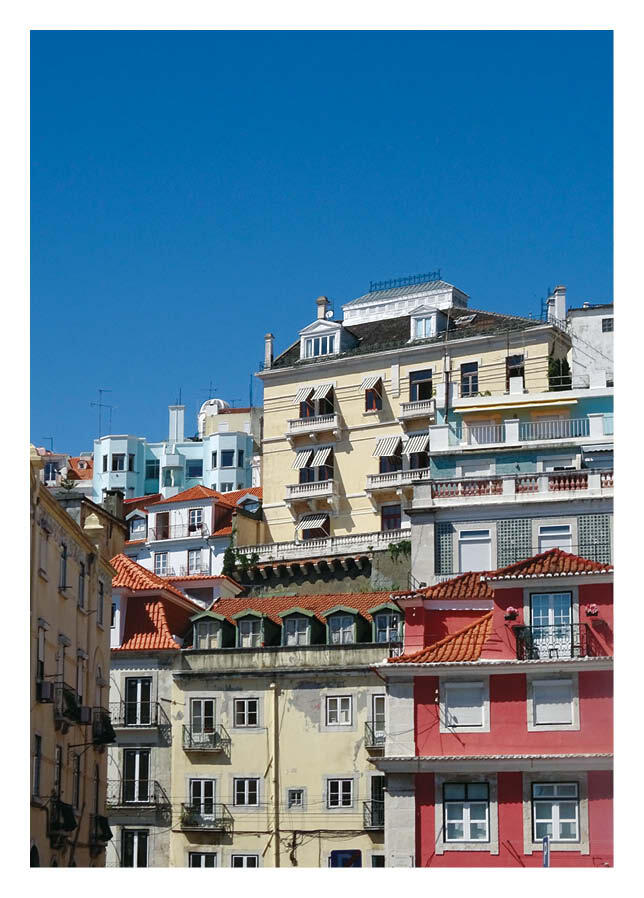 A colour palette that sums up a city: Signature yellow, blue and red buildings against a cloudless Lisbon sky