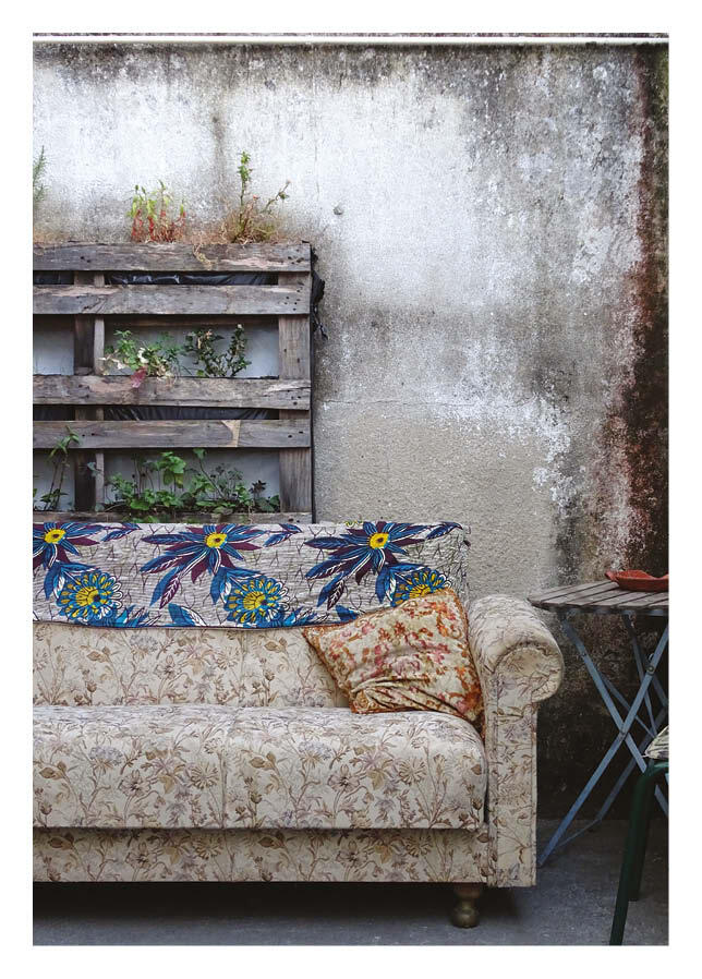 A place that people have made their own: A collection of furniture, objects and contributions that makes community kitchen Cozinha Popular da Mouraria feel like a piece of everyone's home.